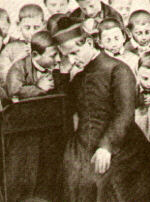 Don Bosco mentre confessa